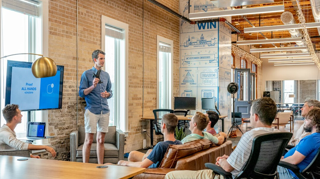 man leading team workshop