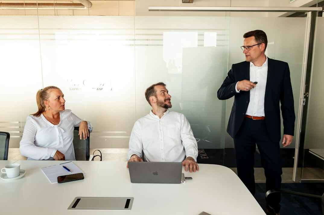 man giving presentation in meeting