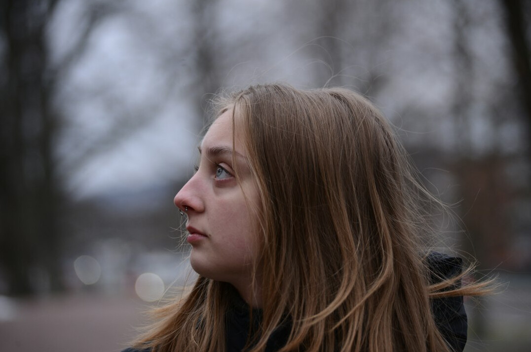 Portrait of a young woman with light brown hair